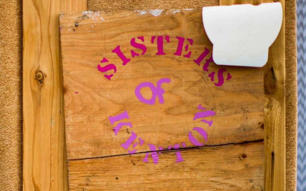 A sign at Kenton Women's Village that says "Sisters of Kenton"