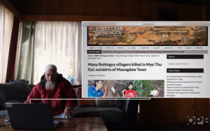 A Rohingya man accesses information about atrocities that occurred in his village